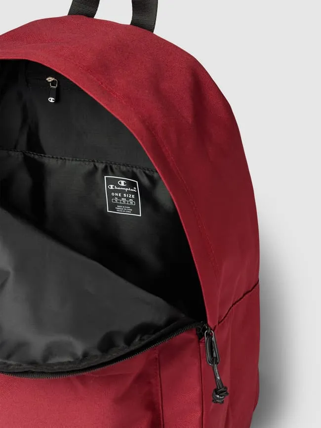 Backpack with CHAMPION label, dark red