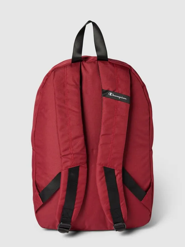 Backpack with CHAMPION label, dark red