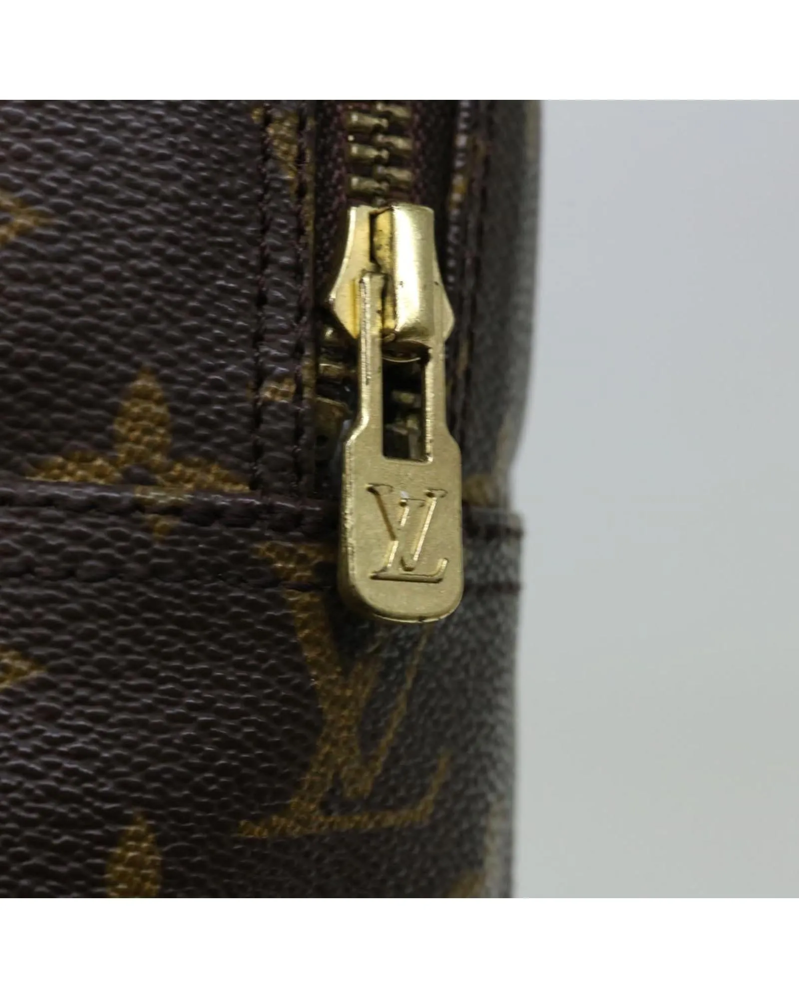 Monogram Trousse Toilette 28 Clutch Bag by Louis Vuitton